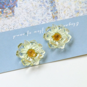 Handmade resin flower charms with yellow daisies for DIY earrings and hair accessories