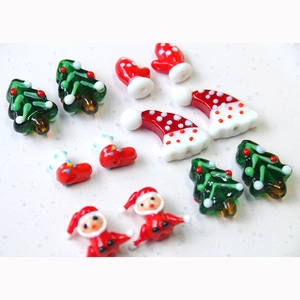 Detailed Christmas glass charms including Santa hat, tree, and boots for DIY jewelry crafts