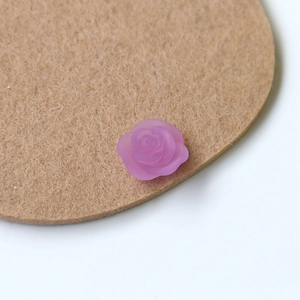 Macro detail of purple matte frosted resin rose flower petal for DIY jewelry crafts