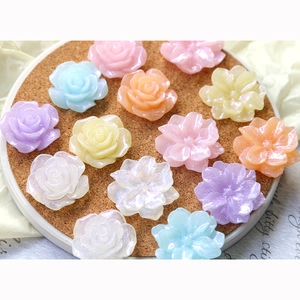 Glittery resin rose and flower charms for DIY crafts and hair accessories in pastel colors