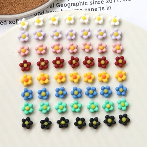 Colorful resin flower beads for nail art and DIY jewelry in eight vibrant pastel shades
