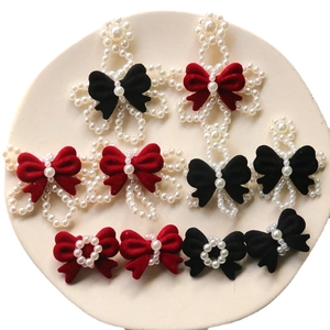 DIY handmade velvet bow hair clips with pearl beads for elegant floral jewelry making