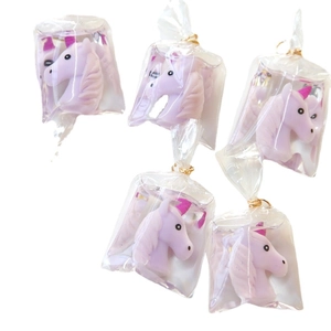 Five pack of cute pastel purple unicorn resin figurines in transparent bags for DIY crafts