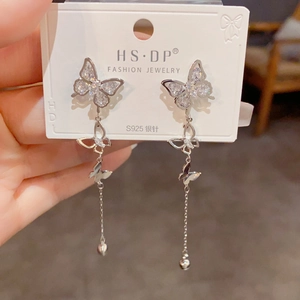 Detail of butterfly tassel earrings with S925 silver needles and sparkling zircons