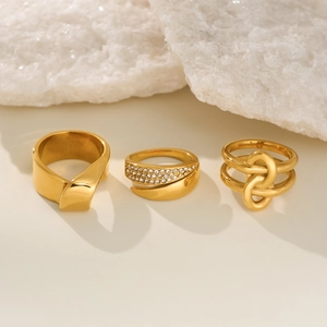 Three-piece set of 18k gold plated stainless steel rings with twisted and zircon designs