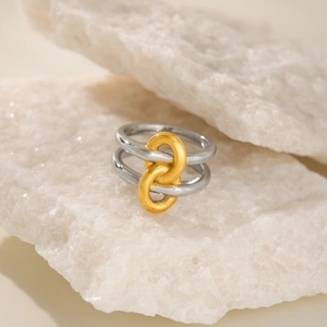Minimalist double layer ring in silver and gold two-tone finish on stone