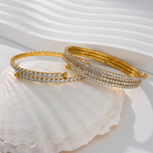 Elegant 18k gold plated titanium steel open cuff bracelet with pavé cubic zirconia crystals