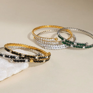 Macro shot of 18k gold plated tennis bracelets with sparkling colorful cubic zirconia