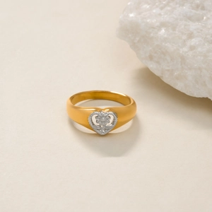 Detailed macro view of 18k gold plated sun ring featuring silver flower heart design