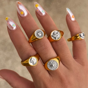 Detailed view of 5-piece retro 18k gold plated sun and 1901 coin rings for women