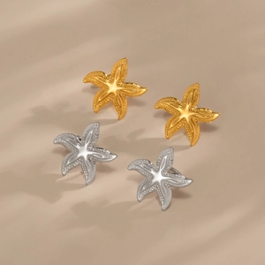 Pendientes de estrella de mar bohemios en oro de 18K y plata con textura rugosa