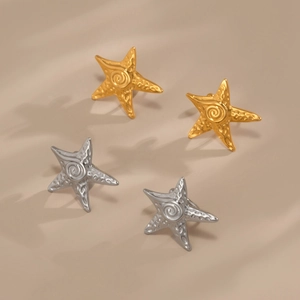 Pendientes de estrella de mar bañados en oro y plata de 18 quilates con textura