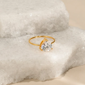 Elegant 18k gold plated titanium ring featuring a large heart-shaped cubic zirconia stone