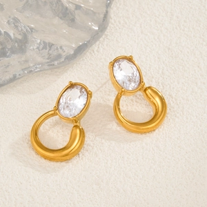 18k gold plated titanium earrings with oval zircon stones in a minimalist C-shape design