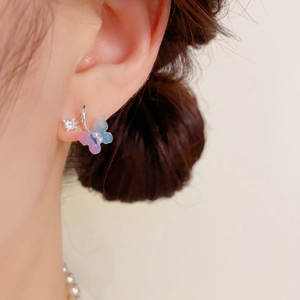 Exquisite S925 silver butterfly earrings with blue-pink gradient and pearl on model