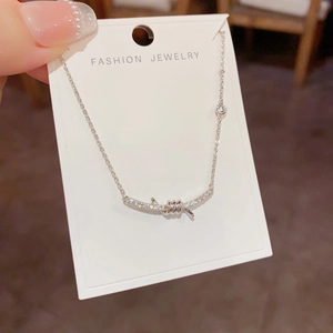 Fashionable knot smile necklace with shimmering diamonds and silver chain for women