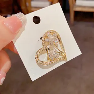 Luxury heart brooch with cubic zirconia flowers, pearls, and thick gold plating