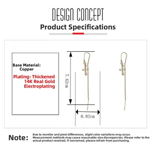 Vue technique des boucles d'oreilles croix plaquées or 14K, dimensions 7,42cm et 0,92cm