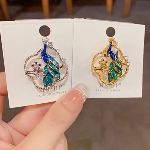 Vintage Hollow Peacock Enamel Brooch For Women Gold Plated Copper Brooch Pin With Zirconia Four Leaf Flower Clothing Accessory