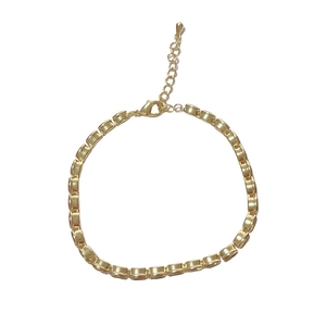 Elegant gold oval link bracelet with sparkling rhinestones and adjustable lobster clasp