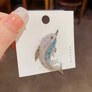 Exquisite dolphin brooch with white zircon and blue crystal set in thick gold plating