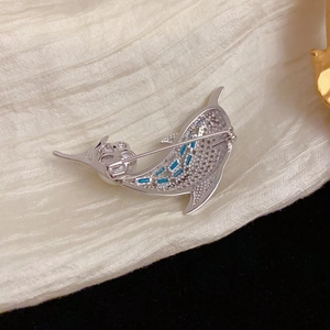 Elegant silver dolphin brooch with blue crystals and sparkling zircons for women's suits