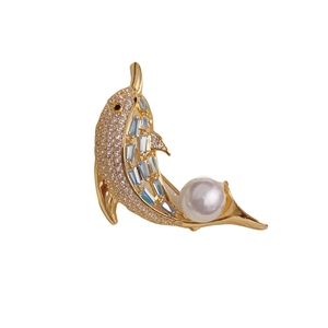 Exquisite gold dolphin brooch with sparkling zircon, blue gemstones and a white pearl accent