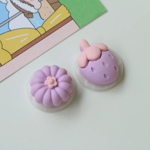 Close-up of colorful 3D resin flower and fruit charms for DIY jewelry and hair accessories