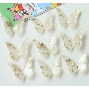 Crèmekleurige vlinderbedeltjes van hars met goudfolie voor DIY haaraccessoires en sieraden