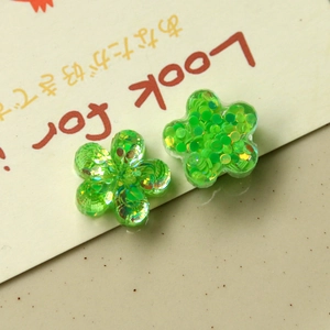 Green resin flower charms with sparkling sequins for DIY jewelry making and crafts