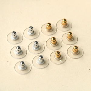 Mix of 12 gold and silver metal ear nuts with clear plastic stabilizing discs
