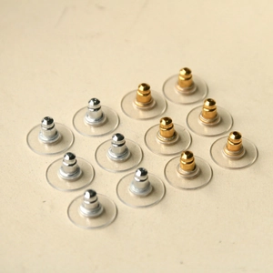 Food-grade stainless steel flying saucer earring backs in gold and silver finishes