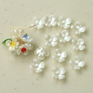 Detailed white pearlescent orchid petal flower charms for DIY jewelry and hair clips