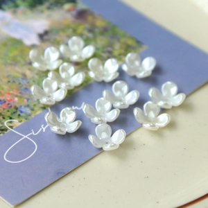 Pearlescent white orchid flower beads with center hole for DIY jewelry making and crafts