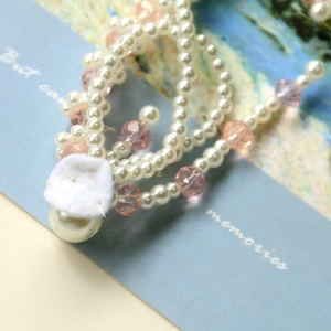 French vintage bracelet with white pearls, pink crystals and soft fabric flower charm