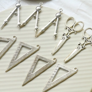Vintage silver alloy DIY charms featuring miniature compass, scissors, and scale ruler design