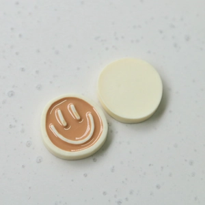 Cute resin charms with smiling face design and cream white finish for DIY jewelry