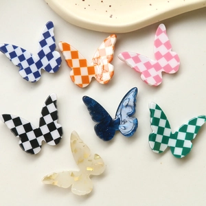 Colorful checkerboard and gold foil butterfly resin charms for DIY jewelry making