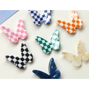 DIY resin butterfly accessories in checkered and gold leaf patterns for jewelry making