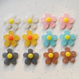 Set of 12 colorful resin flower charms for DIY jewelry and crafts in soft pastel tones