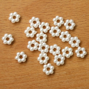 Bulk DIY acrylic pearl flower beads in ivory white for handmade jewelry and accessories