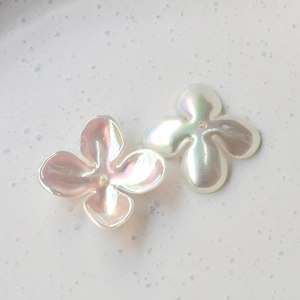 Iridescent four-leaf clover flower resin charms with pearl finish for DIY jewelry making