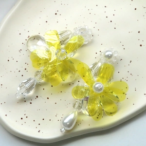 Handmade transparent yellow flower earrings with acrylic petals and glossy faux pearls