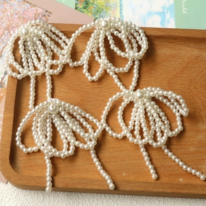 Elegant white pearl woven bow pendant with tassels for bridal hair accessories and DIY jewelry