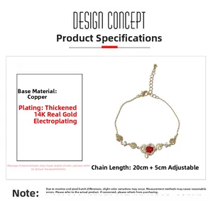 Vue macro détaillée du bracelet coeur doré avec pierre rouge et placage or 14K