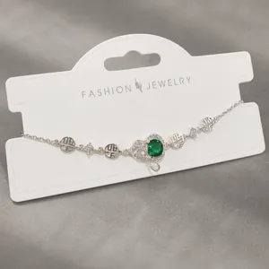 Bracelet en argent avec zircon vert et breloques rondes de caractère Fu chinois