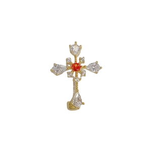 Vintage gold cross brooch with pear-shaped white zircons and orange-red center gemstone