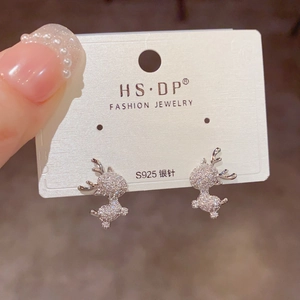 Close-up of S925 silver reindeer earrings with sparkling full-diamond pavé setting