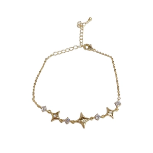 Elegant gold plated star bracelet with sparkling cubic zirconia and adjustable chain