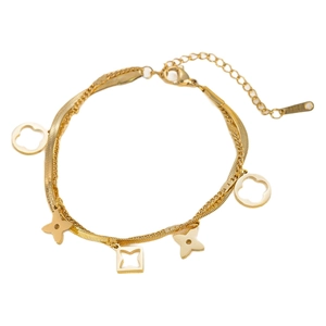 Collar de doble capa en acero de titanio dorado con dijes de estrella y trébol para mujer